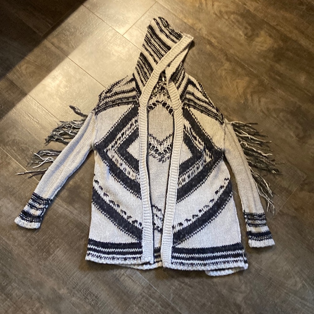 Free people zip up cardigan. Fringes. Hoodie. Aztec print.